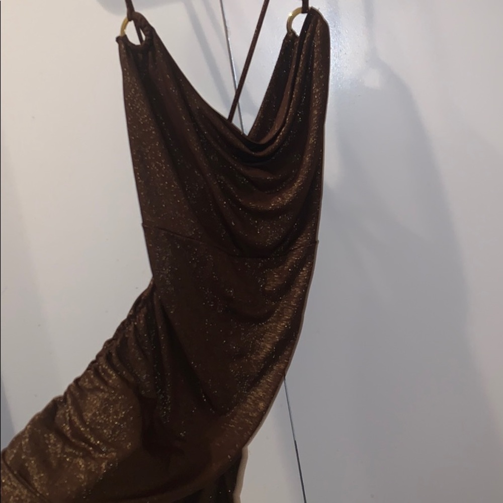 Brown top , spaghetti straps , strap cross back,